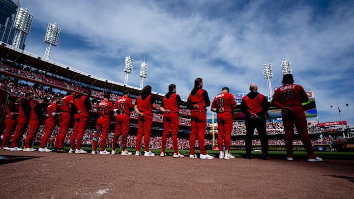 Cincinnati Reds stand for the National Anthem in there city connect uniforms before the Cincinnati Reds and the Los Angeles Angels at Great American Ball in Cincinnati on Saturday, April 11, 2026.