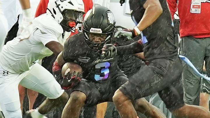 Team Roses' Easton Royal (3) looks for an opening during the Under Armour All-America Game Saturday, Jan. 3, 2026 at Spec Martin Stadium in DeLand. Team Roses' Easton Royal (3) looks for an opening during the Under Armour All-America Game Saturday, Jan. 3, 2026 at Spec Martin Stadium in DeLand.