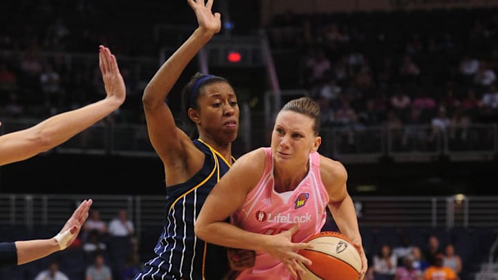 Aug 8, 2010; Phoenix, AZ, USA; Phoenix Mercury forward Penny Taylor drives the ball against Indiana Fever forward Jessica Moore during the second half at US Airways Center. The Fever defeated the Mercury 104-82. Mandatory Credit: Jennifer Stewart-Imagn Images Aug 8, 2010; Phoenix, AZ, USA; Phoenix Mercury forward Penny Taylor drives the ball against Indiana Fever forward Jessica Moore during the second half at US Airways Center. The Fever defeated the Mercury 104-82. Mandatory Credit: Jennifer Stewart-Imagn Images