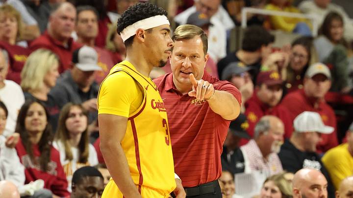 Nov 3, 2025; Ames, Iowa, USA; Iowa State Cyclones head coach T.J. Otzelberger talks with guard Tamin Lipsey (3) during a game with the Fairleigh Dickinson Knights at James H. Hilton Coliseum. Mandatory Credit: Reese Strickland-Imagn Images