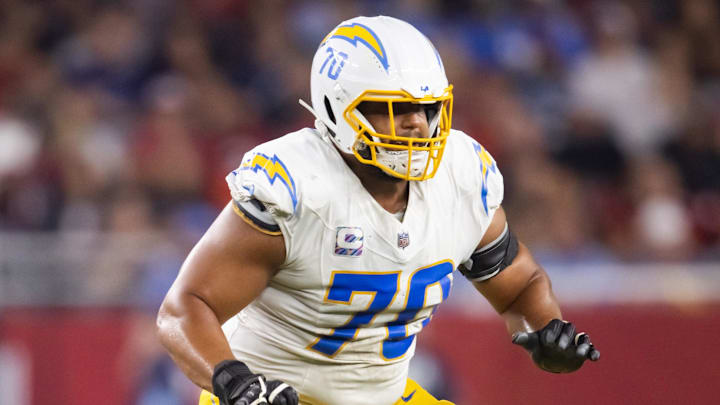 Oct 21, 2024; Glendale, Arizona, USA; Los Angeles Chargers offensive tackle Rashawn Slater (70) against the Arizona Cardinals at State Farm Stadium. Mandatory Credit: Mark J. Rebilas-Imagn Images Oct 21, 2024; Glendale, Arizona, USA; Los Angeles Chargers offensive tackle Rashawn Slater (70) against the Arizona Cardinals at State Farm Stadium. Mandatory Credit: Mark J. Rebilas-Imagn Images