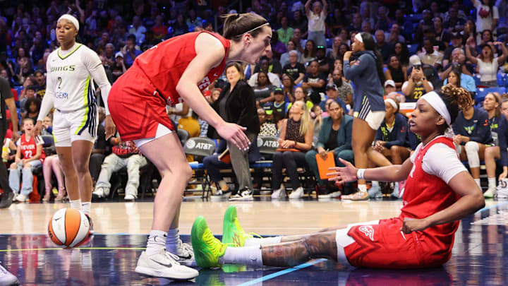 Jul 17, 2024; Arlington, Texas, USA; Indiana Fever guard Caitlin Clark (22) celebrates with Indiana Fever forward NaLyssa Smith (1) during the second half against the Dallas Wings at College Park Center. Mandatory Credit: Kevin Jairaj-Imagn Images Jul 17, 2024; Arlington, Texas, USA; Indiana Fever guard Caitlin Clark (22) celebrates with Indiana Fever forward NaLyssa Smith (1) during the second half against the Dallas Wings at College Park Center. Mandatory Credit: Kevin Jairaj-Imagn Images