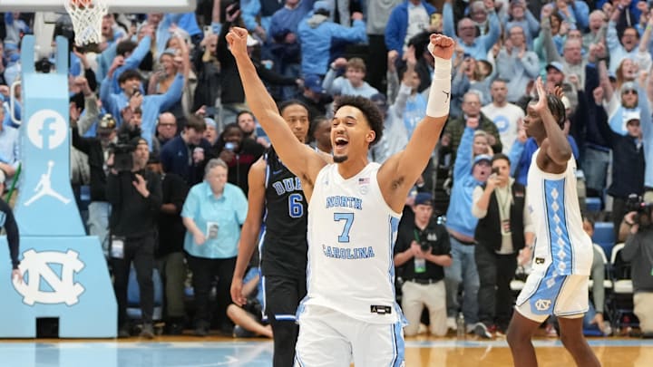 Feb 7, 2026; Chapel Hill, North Carolina, USA; North Carolina Tar Heels guard Seth Trimble (7) celebrates with teammates after the game at Dean E. Smith Center. Mandatory Credit: Bob Donnan-Imagn Images