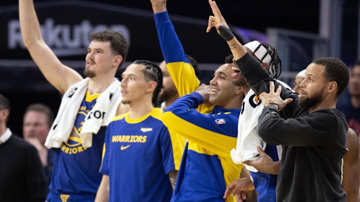 Jan 28, 2025; San Francisco, California, USA; The Golden State Warriors bench celebrates a three-point basket during the fourth quarter against the Utah Jazz at Chase Center. Mandatory Credit: D. Ross Cameron-Imagn Images