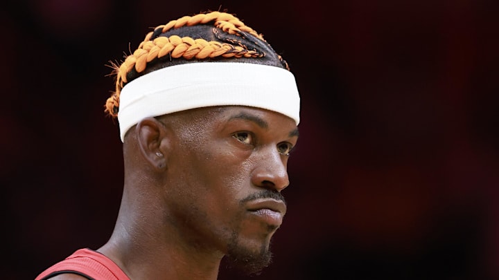Dec 12, 2024; Miami, Florida, USA;  Miami Heat forward Jimmy Butler (22) stands on the court during a time out against the Toronto Raptors  during the first half at Kaseya Center. Mandatory Credit: Rhona Wise-Imagn Images