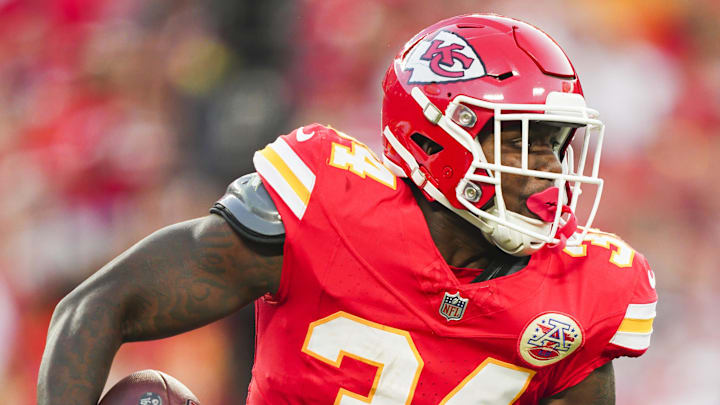 Aug 22, 2024; Kansas City, Missouri, USA; Kansas City Chiefs running back Deneric Prince (34) runs the ball during the first half against the Chicago Bears at GEHA Field at Arrowhead Stadium. Mandatory Credit: Jay Biggerstaff-Imagn Images