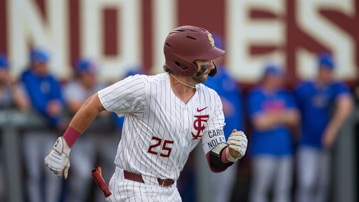Florida State Seminoles catcher Hunter Carns (25) runs towards first base. The Florida State Seminoles hosted the Florida Gators at Dick Howser Stadium on Tuesday, April 7, 2026.