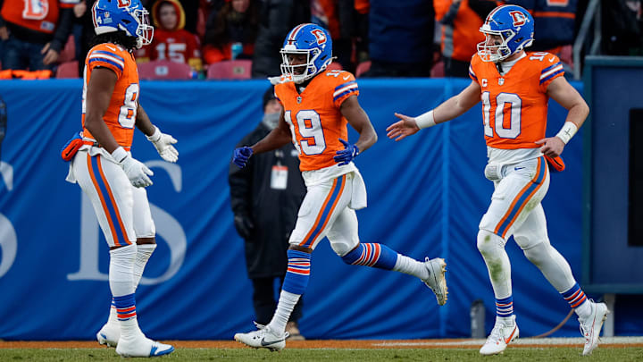 Jan 5, 2025; Denver, Colorado, USA; Denver Broncos wide receiver Marvin Mims Jr. (19) celebrates his touchdown with wide receiver Lil'Jordan Humphrey (84) and quarterback Bo Nix (10) in the third quarter against the Kansas City Chiefs at Empower Field at Mile High. Mandatory Credit: Isaiah J. Downing-Imagn Images Jan 5, 2025; Denver, Colorado, USA; Denver Broncos wide receiver Marvin Mims Jr. (19) celebrates his touchdown with wide receiver Lil'Jordan Humphrey (84) and quarterback Bo Nix (10) in the third quarter against the Kansas City Chiefs at Empower Field at Mile High. Mandatory Credit: Isaiah J. Downing-Imagn Images