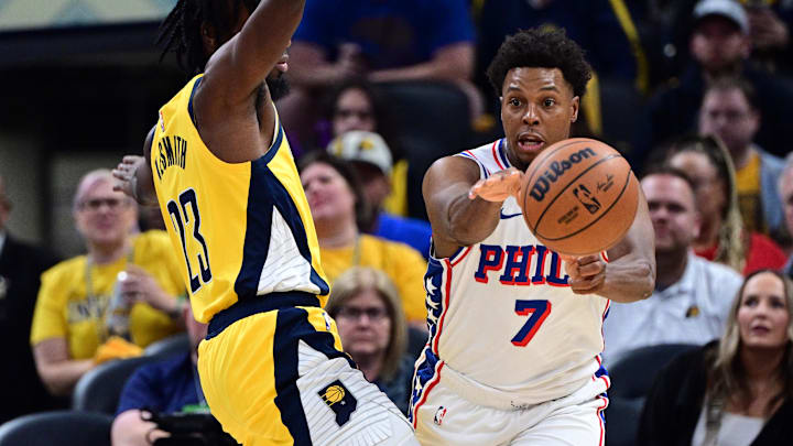 Oct 27, 2024; Indianapolis, Indiana, USA; Philadelphia 76ers guard Kyle Lowry (7) passes the ball away from Indiana Pacers forward Aaron Nesmith (23) during the second quarter at Gainbridge Fieldhouse. Mandatory Credit: Marc Lebryk-Imagn Images Oct 27, 2024; Indianapolis, Indiana, USA; Philadelphia 76ers guard Kyle Lowry (7) passes the ball away from Indiana Pacers forward Aaron Nesmith (23) during the second quarter at Gainbridge Fieldhouse. Mandatory Credit: Marc Lebryk-Imagn Images