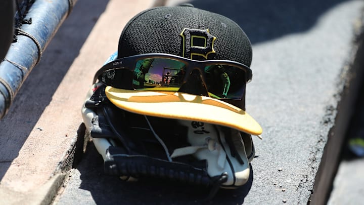 Feb 28, 2019; Tampa, FL, USA; A detail view of Pittsburgh Pirates baseball hat, sunglasses and glove