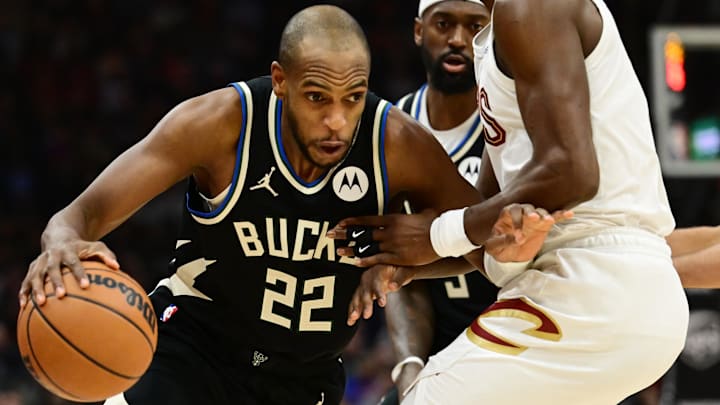 Dec 20, 2024; Cleveland, Ohio, USA; Milwaukee Bucks forward Khris Middleton (22) drives to the basket against Cleveland Cavaliers guard Caris LeVert (3) during the first half at Rocket Mortgage FieldHouse. Mandatory Credit: Ken Blaze-Imagn Images Dec 20, 2024; Cleveland, Ohio, USA; Milwaukee Bucks forward Khris Middleton (22) drives to the basket against Cleveland Cavaliers guard Caris LeVert (3) during the first half at Rocket Mortgage FieldHouse. Mandatory Credit: Ken Blaze-Imagn Images