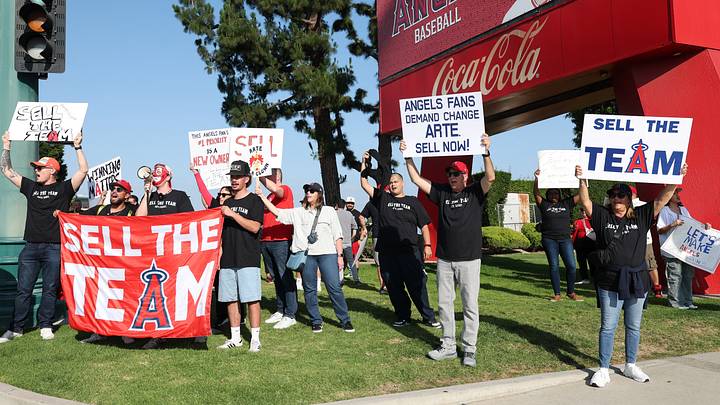 May 23, 2026; Anaheim, California, USA; Los Angeles Angels fans gather outside Angel Stadium before the game between the Los Angeles Angels and the Texas Rangers to protest the Angels team owner Arte Moreno. Mandatory Credit: Kiyoshi Mio-Imagn Images May 23, 2026; Anaheim, California, USA; Los Angeles Angels fans gather outside Angel Stadium before the game between the Los Angeles Angels and the Texas Rangers to protest the Angels team owner Arte Moreno. Mandatory Credit: Kiyoshi Mio-Imagn Images