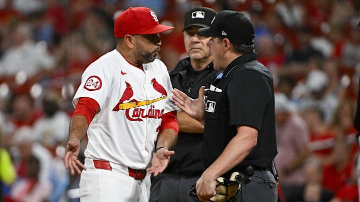 Sep 18, 2024; St. Louis, Missouri, USA;  St. Louis Cardinals manager Oliver Marmol (37) argues with umpire DJ Reyburn (17) after he was ejected from the game against the Pittsburgh Pirates during the fourth inning at Busch Stadium. Mandatory Credit: Jeff Curry-Imagn Images