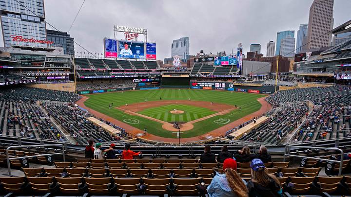 Jun 26, 2025; Minneapolis, Minnesota, USA; Sparsely seated fans watch the Seattle Mariners play the Minnesota Twins in the seventh inning after a nearly four and a half hour rain delay at Target Field. Mandatory Credit: Bruce Kluckhohn-Imagn Images Jun 26, 2025; Minneapolis, Minnesota, USA; Sparsely seated fans watch the Seattle Mariners play the Minnesota Twins in the seventh inning after a nearly four and a half hour rain delay at Target Field. Mandatory Credit: Bruce Kluckhohn-Imagn Images