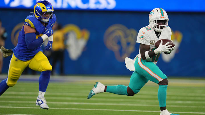 Miami Dolphins wide receiver Tyreek Hill (10) catches the ball against the Los Angeles Rams in the first half at SoFi Stadium. 