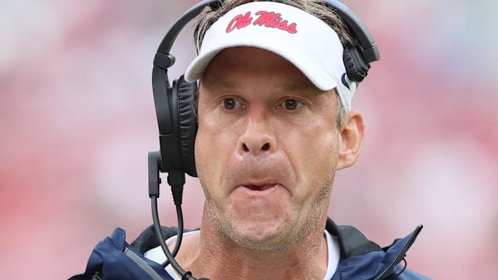 Ole Miss Rebels coach Lane Kiffin whistles at a player in the fourth quarter against Arkansas Razorbacks at Razorback Stadium in Fayetteville, Ark.