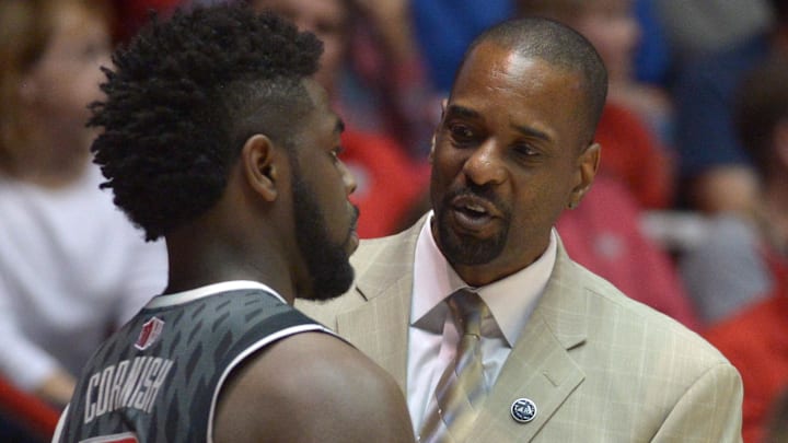 UNLV Runnin' Rebels assistant coach Stacey Augmon (right) talks with guard Jordan Cornish (3) against the New Mexico Lobos at The Pit Arena. UNLV defeated New Mexico 76-68. UNLV Runnin' Rebels assistant coach Stacey Augmon (right) talks with guard Jordan Cornish (3) against the New Mexico Lobos at The Pit Arena. UNLV defeated New Mexico 76-68.
