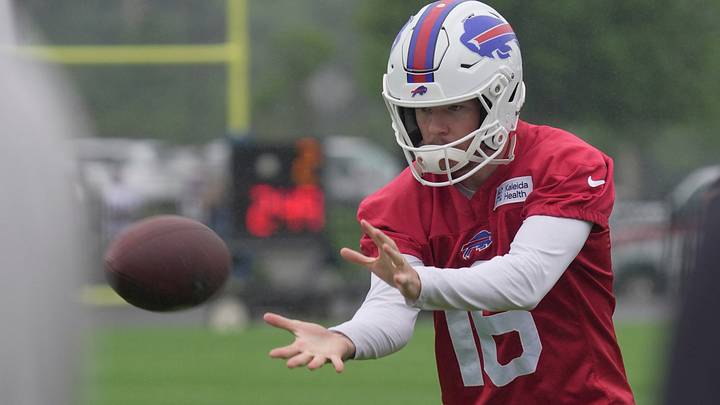 Tyler Bass warms up on the sides catching the ball during Bills Training Camp at St. John Fisher University. Tyler Bass warms up on the sides catching the ball during Bills Training Camp at St. John Fisher University.