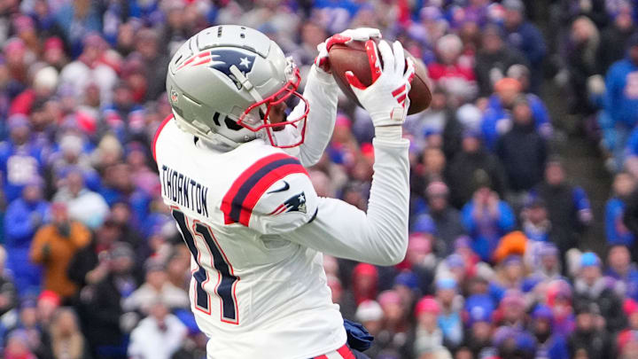 Dec 31, 2023; Orchard Park, New York, USA; New England Patriots wide receiver Tyquan Thornton (11) makes a catch against the Buffalo Bills during the second half at Highmark Stadium. Mandatory Credit: Gregory Fisher-Imagn Images