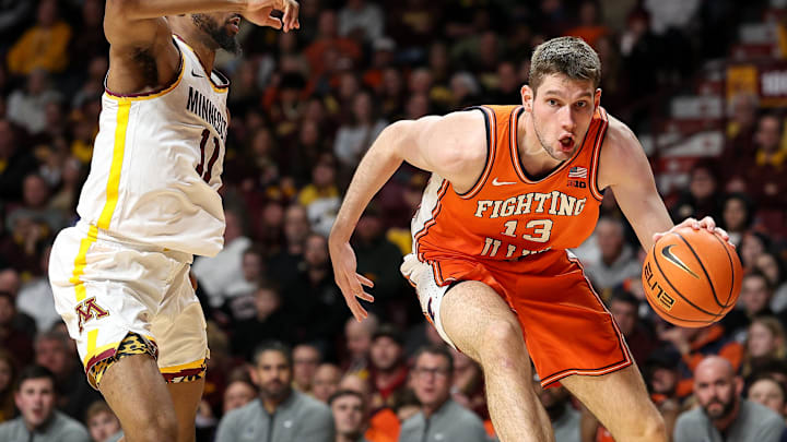 Feb 8, 2025; Minneapolis, Minnesota, USA; Illinois Fighting Illini center Tomislav Ivisic (13) works around Minnesota Golden Gophers guard Femi Odukale (11) during the second half at Williams Arena. Mandatory Credit: Matt Krohn-Imagn Images