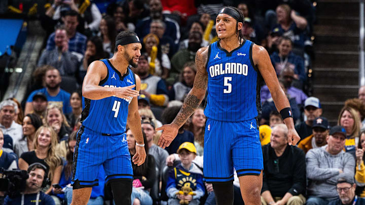 Nov 19, 2023; Indianapolis, Indiana, USA; Orlando Magic forward Paolo Banchero (5)  celebrates his made slam dunk with  guard Jalen Suggs (4) in the first half against the Indiana Pacers at Gainbridge Fieldhouse. Mandatory Credit: Trevor Ruszkowski-Imagn Images