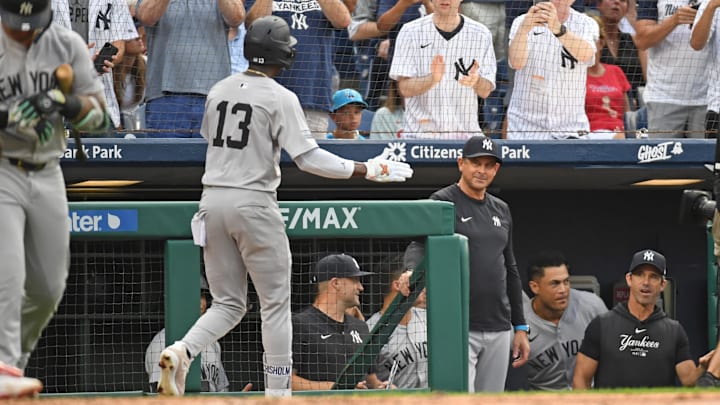Jul 29, 2024; Philadelphia, Pennsylvania, USA; New York Yankees third baseman Jazz Chisholm, Jr (13) celebrates his home run with manager Aaron Boone (17) against the Philadelphia Phillies during the second inning at Citizens Bank Park. Mandatory Credit: Eric Hartline-Imagn Images Jul 29, 2024; Philadelphia, Pennsylvania, USA; New York Yankees third baseman Jazz Chisholm, Jr (13) celebrates his home run with manager Aaron Boone (17) against the Philadelphia Phillies during the second inning at Citizens Bank Park. Mandatory Credit: Eric Hartline-Imagn Images