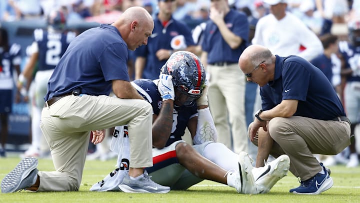 Mississippi Rebels medical staff check on Mississippi Rebels defensive lineman Princely Umanmielen (1) after an injury during the first half against the Oklahoma Sooners at Vaught-Hemingway Stadium. Mississippi Rebels medical staff check on Mississippi Rebels defensive lineman Princely Umanmielen (1) after an injury during the first half against the Oklahoma Sooners at Vaught-Hemingway Stadium.