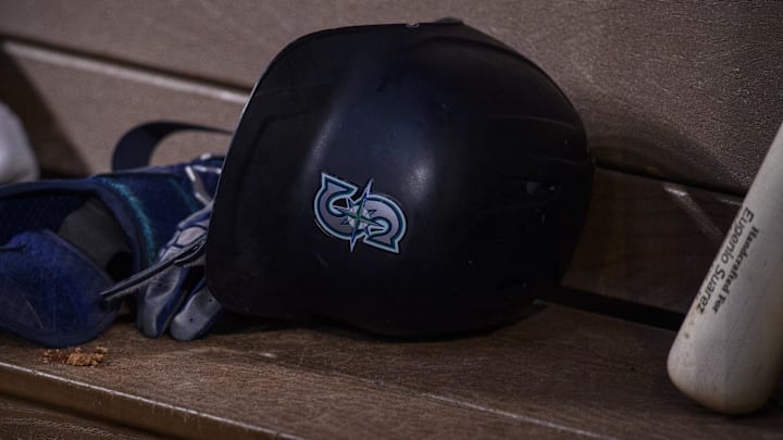 Jun 5, 2022; Arlington, Texas, USA; A view of a Seattle Mariners batting helmet and logo during the game between the Texas Rangers and the Seattle Mariners at Globe Life Field. Mandatory Credit: Jerome Miron-Imagn Images