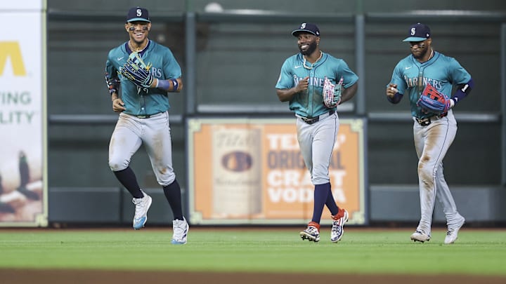 Seattle Mariners center fielder Julio Rodriguez (left) jogs off the field with left fielder Randy Arozarena (center) and right fielder Victor Robles after a game against the Houston Astros on Sept. 23 at Minute Maid Park. Seattle Mariners center fielder Julio Rodriguez (left) jogs off the field with left fielder Randy Arozarena (center) and right fielder Victor Robles after a game against the Houston Astros on Sept. 23 at Minute Maid Park.