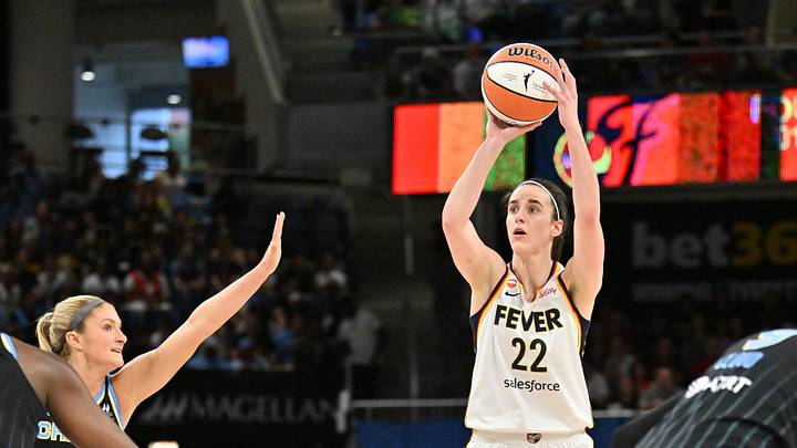 Aug 23, 2026; Chicago, Illinois, USA;  Indiana Fever guard Caitlin Clark (22) hits a three-point shot against the Chicago Sky during the first half at Wintrust Arena.  Mandatory Credit: Patrick Gorski-Imagn Images