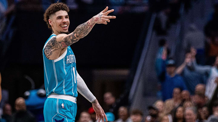 Nov 8, 2024; Charlotte, North Carolina, USA; Charlotte Hornets guard LaMelo Ball (1) celebrates after a three point basket in the fourth quarter against the Indiana Pacers at Spectrum Center. Mandatory Credit: Scott Kinser-Imagn Images