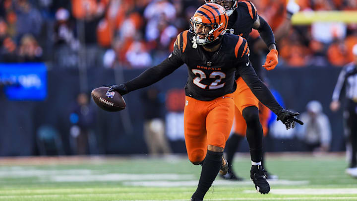 Dec 22, 2024; Cincinnati, Ohio, USA; Cincinnati Bengals safety Geno Stone (22) reacts after intercepting a pass against the Cleveland Browns in the second half at Paycor Stadium.