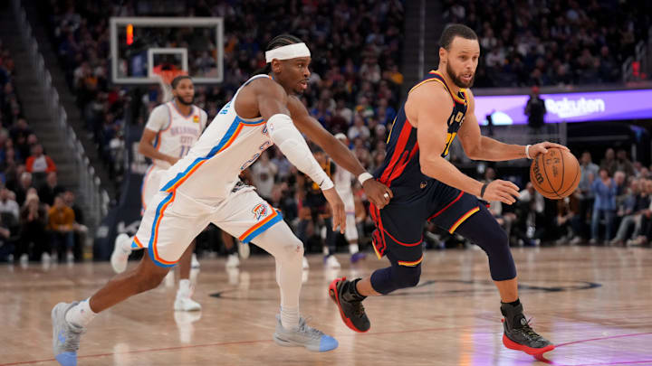 Jan 29, 2025; San Francisco, California, USA; Golden State Warriors guard Stephen Curry (30) dribbles past Oklahoma City Thunder guard Shai Gilgeous-Alexander (2) in the third quarter at the Chase Center. Mandatory Credit: Cary Edmondson-Imagn Images Jan 29, 2025; San Francisco, California, USA; Golden State Warriors guard Stephen Curry (30) dribbles past Oklahoma City Thunder guard Shai Gilgeous-Alexander (2) in the third quarter at the Chase Center. Mandatory Credit: Cary Edmondson-Imagn Images