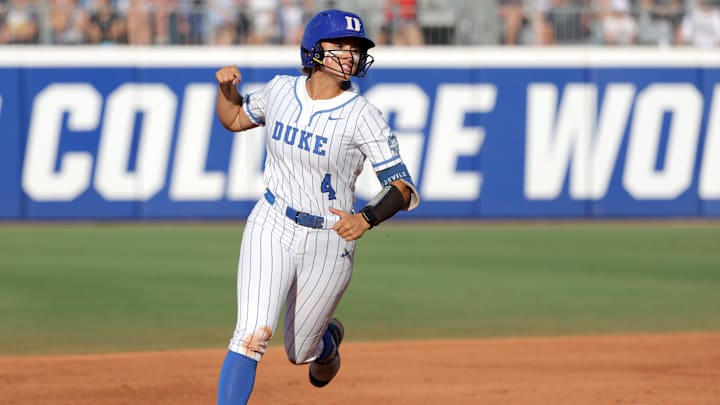 Duke infielder Ana Gold (4) celebrates after hitting a home run in the second inning of a Women's College World Series softball game between the Alabama Crimson Tide and the Duke Blue Devils at Devon Park in Oklahoma City, Friday, May 31, 2024. Alabama won 2-1.