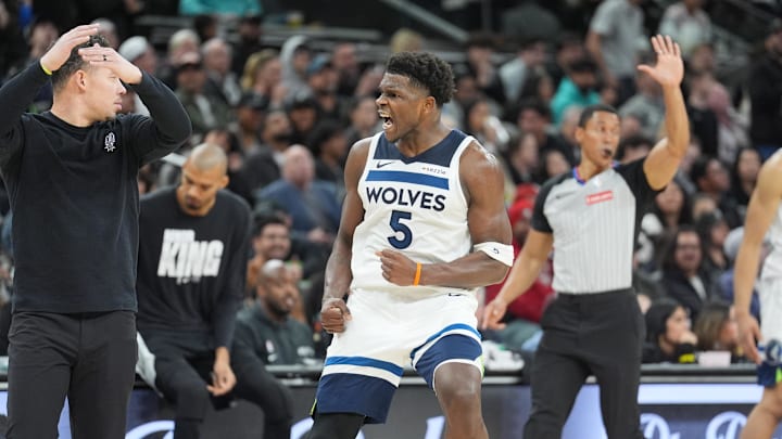 Jan 17, 2026; San Antonio, Texas, USA; Minnesota Timberwolves guard Anthony Edwards (5) reacts toward the San Antonio Spurs bench in the second half at Frost Bank Center.