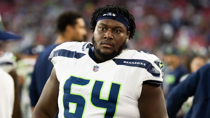 Dec 8, 2024; Glendale, Arizona, USA; Seattle Seahawks guard Christian Haynes (64) against the Arizona Cardinals at State Farm Stadium. Mandatory Credit: Mark J. Rebilas-Imagn Images Dec 8, 2024; Glendale, Arizona, USA; Seattle Seahawks guard Christian Haynes (64) against the Arizona Cardinals at State Farm Stadium. Mandatory Credit: Mark J. Rebilas-Imagn Images