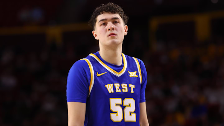 Jan 21, 2026; Tempe, Arizona, USA; West Virginia Mountaineers forward Treysen Eaglestaff (52) against the Arizona State Sun Devils at Desert Financial Arena. Mandatory Credit: Mark J. Rebilas-Imagn Images Jan 21, 2026; Tempe, Arizona, USA; West Virginia Mountaineers forward Treysen Eaglestaff (52) against the Arizona State Sun Devils at Desert Financial Arena. Mandatory Credit: Mark J. Rebilas-Imagn Images