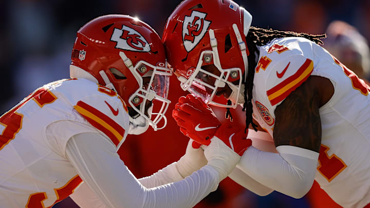 Jan 5, 2025; Denver, Colorado, USA; Kansas City Chiefs linebacker Joshua Uche (55) and linebacker Cam Jones (44) before the game against the Denver Broncos at Empower Field at Mile High. Mandatory Credit: Isaiah J. Downing-Imagn Images