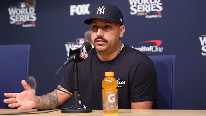 Oct 25, 2024; Los Angeles, California, USA; New York Yankees pitcher Nestor Cortes Jr (65) talks to the media prior to the game against the Los Angeles Dodgers during game one of the 2024 MLB World Series at Dodger Stadium. Mandatory Credit:  Kiyoshi Mio-Imagn Images