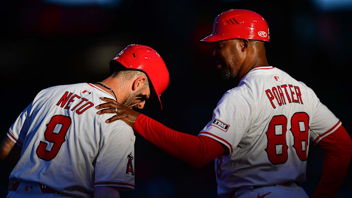Angels third base coach Bo Porter (88) speaks with shortstop Zach Neto (9) during the first inning at Angel Stadium on Aug. 1. Angels third base coach Bo Porter (88) speaks with shortstop Zach Neto (9) during the first inning at Angel Stadium on Aug. 1.