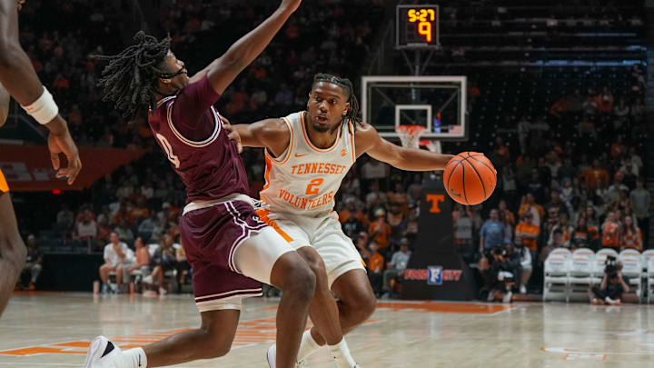 Tennessee guard Chaz Lanier (2) pushes against Montana guard Money Williams (0) during an NCAA basketball game between the Tennessee Volunteers and Montana Grizzlies at Thompson-Boling Arena at Food City Center on Wednesday, Nov. 13, 2024.