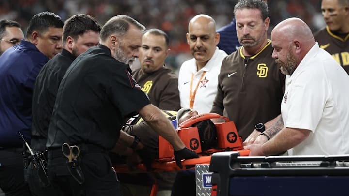 Apr 20, 2025; Houston, Texas, USA;San Diego Padres designated hitter Luis Arraez (4) is carted off the field after he colliding with Houston Astros first baseman Christian Walker (8) (not pictured )on the first base line in the first inning at Daikin Park. Apr 20, 2025; Houston, Texas, USA;San Diego Padres designated hitter Luis Arraez (4) is carted off the field after he colliding with Houston Astros first baseman Christian Walker (8) (not pictured )on the first base line in the first inning at Daikin Park.