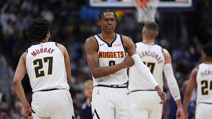 Jan 29, 2026; Denver, Colorado, USA; Denver Nuggets guard Peyton Watson (8) and guard Jamal Murray (27) during the first quarter against the Brooklyn Nets at Ball Arena. Mandatory Credit: Ron Chenoy-Imagn Images