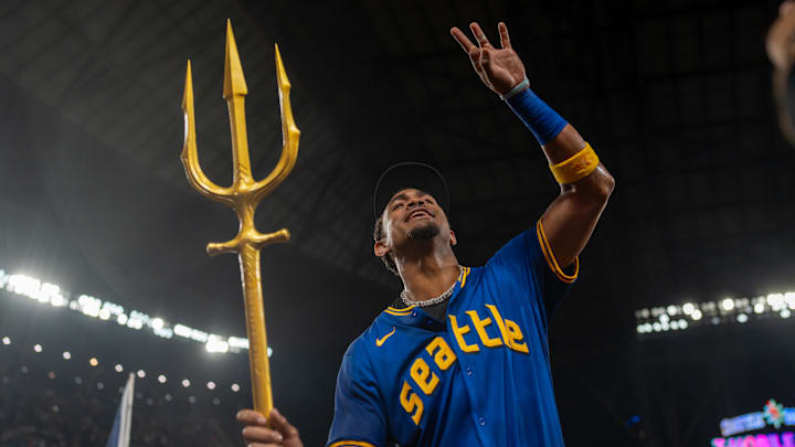 Seattle Mariners center fielder Julio Rodriguez celebrates after a game against the Texas Rangers on Sept. 13 at T-Mobile Park.