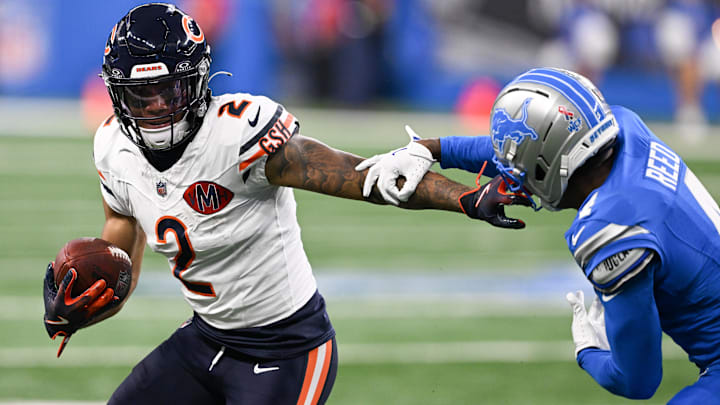 Chicago Bears wide receiver DJ Moore (2) carries the ball defended by Detroit Lions cornerback D.J. Reed (4) during the first quarter of the game at Ford Field.