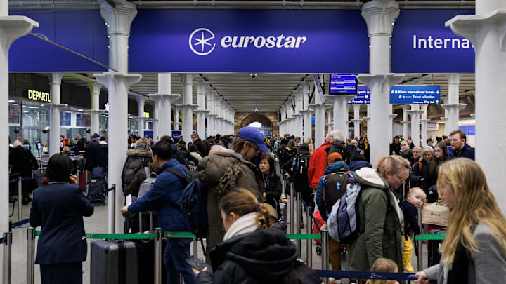European train travelers queue up