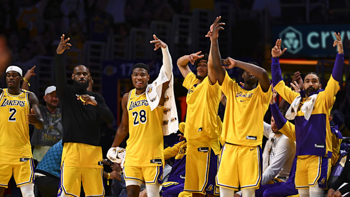 Apr 11, 2025; Los Angeles, California, USA; Los Angeles Lakers forward Jarred Vanderbilt (2), forward LeBron James (23), forward Rui Hachimura (28), center Jaxson Hayes (11), and Los Angeles Lakers guard Gabe Vincent (7) celebrate after scoring against the Houston Rockets during the second half at Crypto.com Arena. Mandatory Credit: Jonathan Hui-Imagn Images