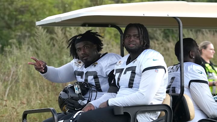 Oct 5, 2023; Ware, United Kingdom; Jacksonville Jaguars center Darryl Williams (60) and offensive tackle Anton Harrison.