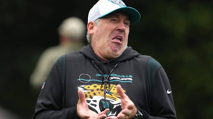 Oct 16, 2024; Watford, United Kingdom; Jacksonville Jaguars coach Doug Pederson reacts during practice at The Grove. Mandatory Credit: Kirby Lee-Imagn Images