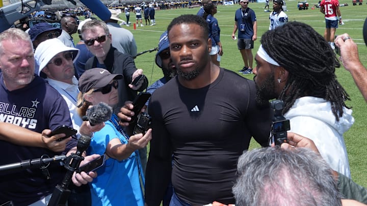 Dallas Cowboys stars Micah Parsons and Trevon Diggs talks to media during training camp at the River Ridge Fields. 